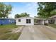 Well-maintained front exterior of a charming single-story home, showcasing curb appeal at 1317 E Laura St, Plant City, FL 33563