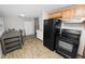 Efficient kitchen with modern appliances, adjacent dining area, and ample storage at 1317 E Laura St, Plant City, FL 33563