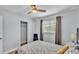 Serene bedroom with a plush bed, soft lighting, and a closet offering ample storage space at 1603 N Park Rd, Plant City, FL 33563