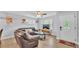 Bright living room with modern furniture, a ceiling fan, and a welcoming atmosphere at 1603 N Park Rd, Plant City, FL 33563