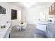 Bright Bedroom with a crib, toys, and a chalkboard wall for creative play at 2750 Walden Town Cir, Plant City, FL 33566