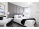 Comfortable bedroom featuring a queen bed, stylish decor, and plenty of natural light at 2750 Walden Town Cir, Plant City, FL 33566