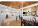Open-concept view of the dining room, cabinets, and partial view to the living room at 3611 Maxwell Rd, Plant City, FL 33566