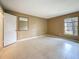 Neutral bedroom with tile flooring and ample natural light from the window at 4022 Tumble Wood Trl # 101, Tampa, FL 33613