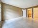 Inviting living room featuring neutral paint, tile floors, and natural light at 4022 Tumble Wood Trl # 101, Tampa, FL 33613