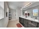 Stylish bathroom featuring a double sink vanity, granite countertops, and a walk-in shower at 503 Arbequina Ct, Plant City, FL 33566