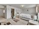 Bright bedroom with a work space, neutral carpet, and lots of storage in an attached walk-in closet at 503 Arbequina Ct, Plant City, FL 33566