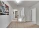 Spacious hallway with neutral carpet and natural light at 503 Arbequina Ct, Plant City, FL 33566
