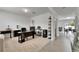 Spacious home office with neutral carpet, bright lighting, and large windows at 503 Arbequina Ct, Plant City, FL 33566