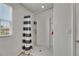Modern shower with a glass partition and vertical shelving for organization of toiletries at 503 Arbequina Ct, Plant City, FL 33566