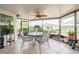 Florida room with a ceiling fan and elegant outdoor views at 2024 E Del Webb Blvd, Sun City Center, FL 33573