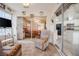 Relaxing Florida room with view into the Primary bedroom and kitchen at 2024 E Del Webb Blvd, Sun City Center, FL 33573