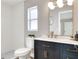 Updated bathroom featuring white tile shower, quartz countertops and modern vanity at 2306 33Rd W St, Bradenton, FL 34205