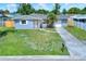 Charming single-story home featuring a well-manicured lawn, and a lovely front yard at 2306 33Rd W St, Bradenton, FL 34205