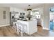 Bright kitchen features a center island with seating and modern appliances at 2306 33Rd W St, Bradenton, FL 34205