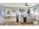 Inviting living space with a modern sofa, dining area, and a view of the stylish décor at 2306 33Rd W St, Bradenton, FL 34205