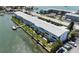 Waterfront condo with canal access, boat docks, and lush landscaping at 1893 Shore S Dr # 208, South Pasadena, FL 33707