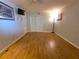 Bedroom with wood floors, ceiling fan, and closet, providing ample storage and a cozy atmosphere at 1893 Shore S Dr # 208, South Pasadena, FL 33707