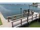 Well maintained private boat dock with seating at 1893 Shore S Dr # 208, South Pasadena, FL 33707