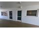 Exterior hallway featuring condo units with a view at 1893 Shore S Dr # 208, South Pasadena, FL 33707