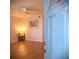 Bright living room with wood floors, ceiling fan, and neutral paint, creating a cozy atmosphere at 1893 Shore S Dr # 208, South Pasadena, FL 33707