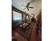 Inviting living room with hardwood floors, a ceiling fan, and natural light at 4108 W Euclid Ave, Tampa, FL 33629