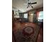 Inviting living room with hardwood floors, a brick fireplace, and natural light at 4108 W Euclid Ave, Tampa, FL 33629
