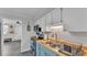 Functional kitchen with stainless steel appliances, a double sink, and an open layout at 4818 Huron St, Zephyrhills, FL 33541