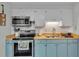 Updated kitchen with stainless steel appliances, and plenty of storage at 4818 Huron St, Zephyrhills, FL 33541