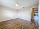 Bright bedroom featuring modern ceiling fan and sleek, updated flooring throughout the room at 5980 80Th N St # 408, St Petersburg, FL 33709