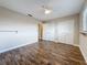 Bright bedroom features a ceiling fan, two large closets, and sleek, updated flooring throughout at 5980 80Th N St # 408, St Petersburg, FL 33709