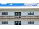 Charming multi-story condo building boasting a neutral color scheme and a well-maintained facade at 5980 80Th N St # 408, St Petersburg, FL 33709