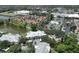 Scenic aerial view of the community highlighting the building exteriors and serene water features at 3608 54Th W Dr # 202, Bradenton, FL 34210