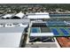Aerial view showcasing the athletic complex with multiple tennis courts and modern buildings at 3608 54Th W Dr # 202, Bradenton, FL 34210