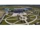 Aerial view of the sports complex, including manicured fields, running track, and modern buildings at 3608 54Th W Dr # 202, Bradenton, FL 34210