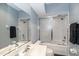 Clean bathroom with tub and shower combo, mirrored wall, and updated sink at 3608 54Th W Dr # 202, Bradenton, FL 34210
