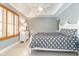 Comfortable bedroom showcasing natural light, tray ceiling, and neutral color palette at 3608 54Th W Dr # 202, Bradenton, FL 34210