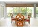 Inviting dining area with scenic outdoor views, perfect for enjoying meals in a tranquil setting at 3608 54Th W Dr # 202, Bradenton, FL 34210