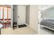 Cozy entryway with a gray wall, tiled floor, and bedroom access at 3608 54Th W Dr # 202, Bradenton, FL 34210