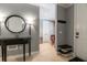 Welcoming entryway with tiled floors, a decorative table, and convenient shoe storage at 3608 54Th W Dr # 202, Bradenton, FL 34210