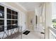 Charming entryway with a white front door, tiled floor, and a 'hello' welcome mat at 3608 54Th W Dr # 202, Bradenton, FL 34210