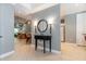 Elegant foyer with tiled floors, a decorative table, and an open view to the living area at 3608 54Th W Dr # 202, Bradenton, FL 34210