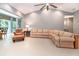 Spacious living room with tile floors, neutral decor, and recessed lighting creating a welcoming atmosphere at 3608 54Th W Dr # 202, Bradenton, FL 34210