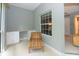 Bright office nook with built-in desk and a chair at 3608 54Th W Dr # 202, Bradenton, FL 34210