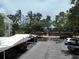 Designated covered parking spots with a view of tennis courts at 3608 54Th W Dr # 202, Bradenton, FL 34210