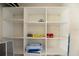 A spacious, empty shelving system, perfect for maximizing organization and storage at 3608 54Th W Dr # 202, Bradenton, FL 34210