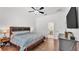 Charming bedroom with hardwood floors and neutral paint at 3911 Smoke Rise Ct, Valrico, FL 33594