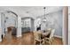 Dining room with views to the kitchen, living room, and front of the house at 3911 Smoke Rise Ct, Valrico, FL 33594
