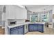 Bright kitchen with white subway tile backsplash, stainless steel appliances, and a dining area nearby at 3911 Smoke Rise Ct, Valrico, FL 33594