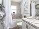 Nicely tiled bathroom features a combination tub and shower and single sink vanity at 6926 161St E Ter, Parrish, FL 34219